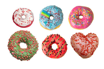 Set of multi-colored donuts with different sprinkles on a white background. Isolated. Flat lay. Top...