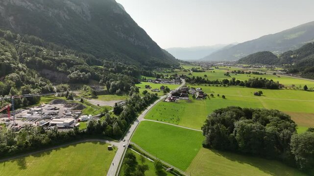 Aerial View of Swiss Farmland and Mountain Landscape Near Flums, Berschis and Walenstadt, Switzerland &ndash; Drone Footage