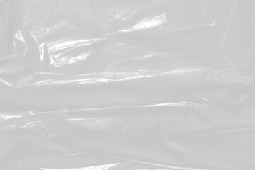 plastic overlay texture of realistic crumpled transparent plastic film wrap on black...