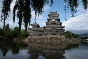 Matsumoto Castle or Crow Castle in Summer, is one of Japanese premier historic castles in easthern...
