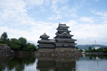 Matsumoto Castle or Crow Castle in Summer, is one of Japanese premier historic castles in easthern...