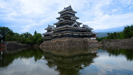 Matsumoto Castle or Crow Castle in Summer, is one of Japanese premier historic castles in easthern...