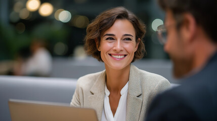 One-on-One Coaching Meeting in Modern Office Setting