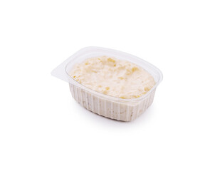 Creamy rice pudding with a hint of vanilla served in a plastic container