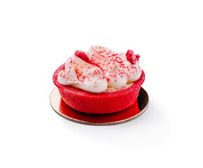 Delicious red velvet dessert topped with cream and raspberries on a plate