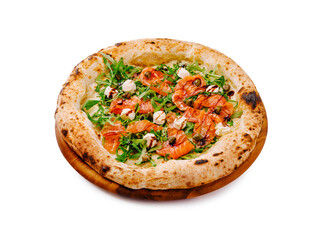 Delicious salmon pizza with arugula served on a wooden platter