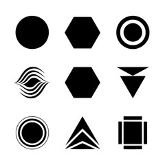 Geometric Shape Assortment: An assortment of simple, stark, geometric shapes in a symmetrical array against a flat canvas, suitable for any design project requiring fundamental design elements.