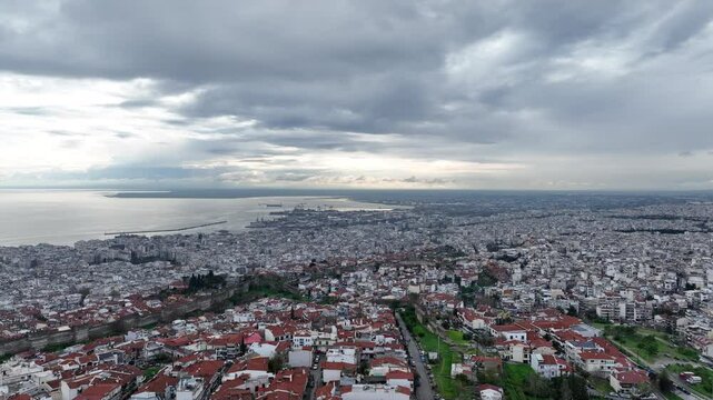 Coastal Port City With Red Roofs and Overcast Atmosphere