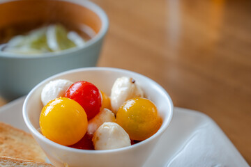 Mini Tomato and Mozzarella Salad in White Bowl / ミニトマトとモッツァレラのカプレーゼ風サラダ
