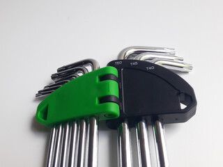 A set of torx keys or star L keys isolated on a white background, used to tighten or loosen shaped bolts.