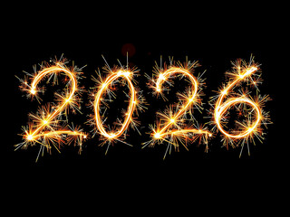 2026 New Year concept showcasing number 2026 made from golden sparklers against a black background. 