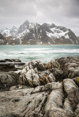 Fjord Surrounded by Snow-Capped Mountains in Lofoten Islands