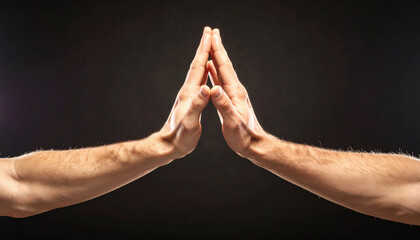 Hands Meeting in Symmetrical Gesture on Dark Background