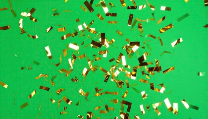 Gold confetti on green background