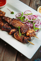 Steaks with seasoning and herbs