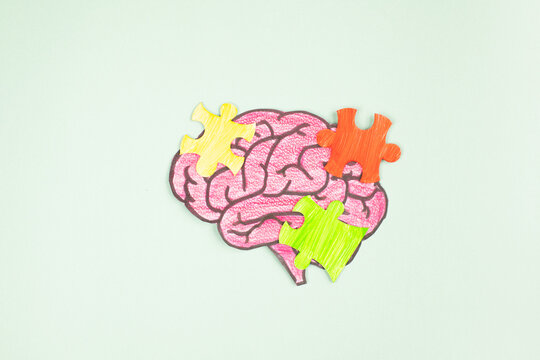 ADHD, attention deficit hyperactivity disorder, mental health, brain with cognitive difficulty, colorful puzzle pieces