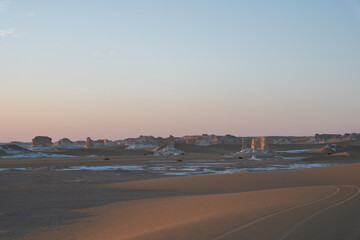 White rock formations and sand dunes in Egypt's White Desert, natural desert landscape	