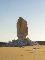 White rock formations and sand dunes in Egypt's White Desert, natural desert landscape	