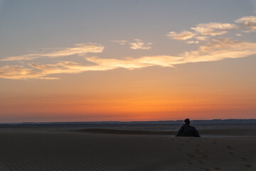 Beautiful sunset over sand dunes in the White Desert in Egypt	