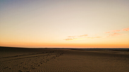 Beautiful sunset over sand dunes in the White Desert in Egypt	