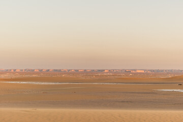 White rock formations and sand dunes in Egypt's White Desert, natural desert landscape	