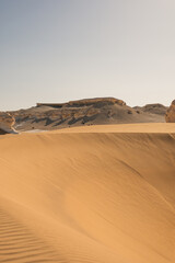White rock formations and sand dunes in Egypt's White Desert, natural desert landscape	