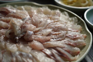 Freshly Sliced Korean Sashimi Platter. Raw Fish Served on a Plate