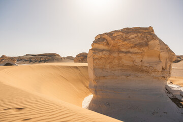 White rock formations and sand dunes in Egypt's White Desert, natural desert landscape	