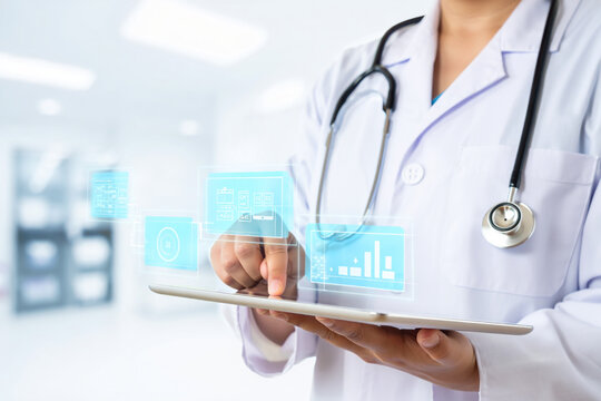 Doctor using tablet with holographic medical data healthcare technology