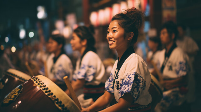 Women in Matching Festival Uniforms Watching the Parade at Awa Odori Festival Representing Team Spirit, Performance Discipline, and Cultural Dedication in Japan