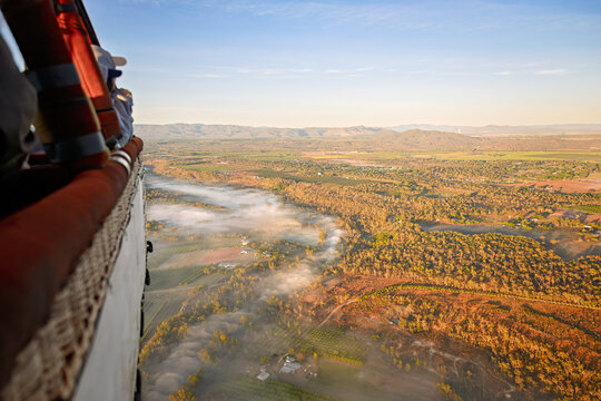 hot air balloon flight over Atherton Tablelands, Queensland Australia, foggy dawn landscape