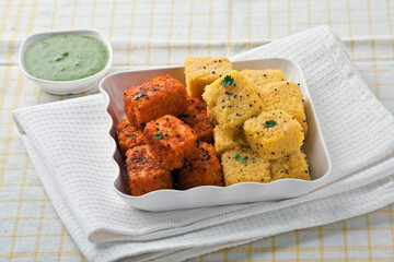 Vadodara, Gujarat / India - January 07, 2015 : Spicy Khaman, an Indian snack.