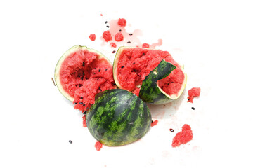 Close-up of a broken watermelon isolated on a white background