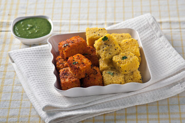 Vadodara, Gujarat / India - January 07, 2015 : Spicy Khaman, an Indian snack.