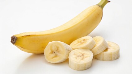 A ripe banana with slices on a white background