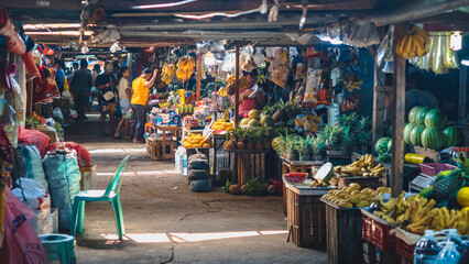 Coron Town market vegetables, fruits, and food stands in old fashion wooden stands in Coron Public...