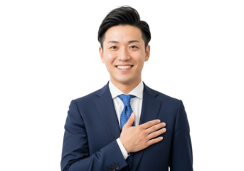 trustworthy asian executive in business suit standing with confident expression

