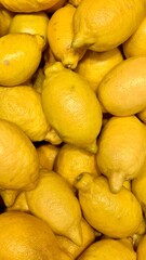 Fresh Lemons background. Healthy raw food at the food market