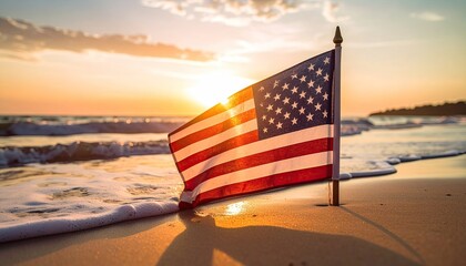 American flag on a beach at sunset