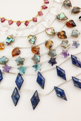 Colorful Gemstone Beads Featuring Garnet, Crystal Quartz, Shell, Montana Agate, Fluorite, and Lapis...