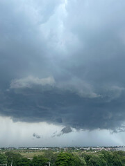 Dramatic Storm Clouds Over Cityscape Before Rain