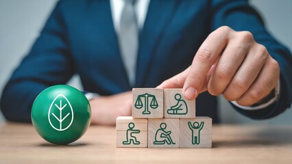 ESG concept displaying environmental, social, governance on wooden blocks
