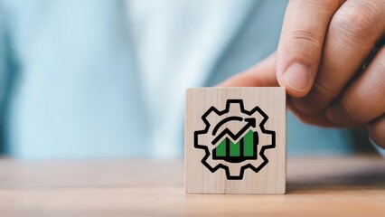 Business growth concept with wooden block showing upswing chart