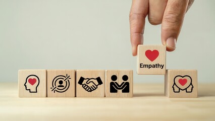 Building empathy with wooden blocks showing heart and connection