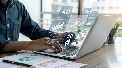 Digital marketing commerce online sale concept, Businessman use laptop with advertising on website. planning advertising marketing strategies to target social media native, ad, advertisers, sales.