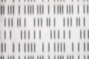 Abstract pattern of vertical lines on white surface