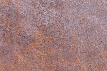 Rusty metal surface texture with brown and orange hues