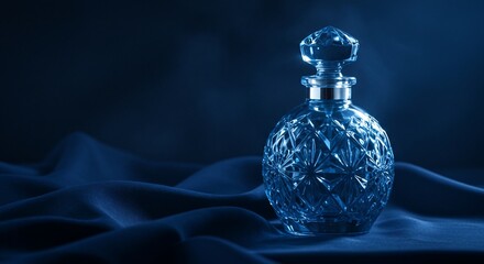 Ornate Crystal Decanter on a Bed of Dark Blue Silk