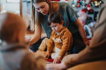 A mother closely interacts with her children during a festive holiday gathering, fostering warmth,...