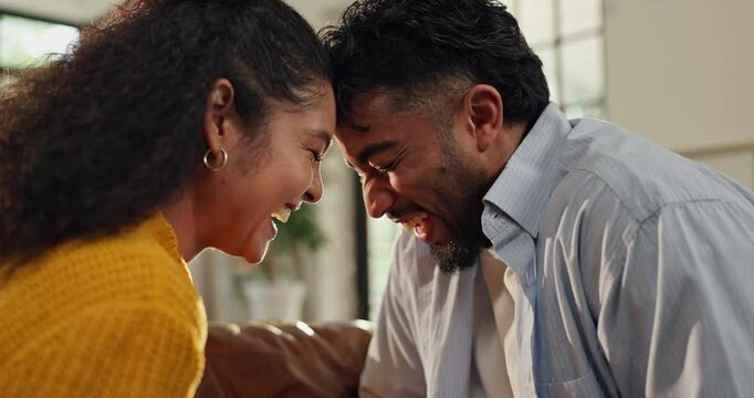 Forehead, laugh and couple in home for love, bonding and relationship in living room together. Dating, commitment and man with woman with sunlight for trust, affection and connection in apartment